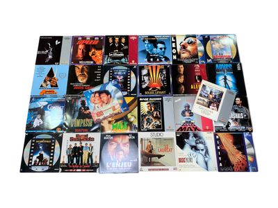 many different movie posters on the wall