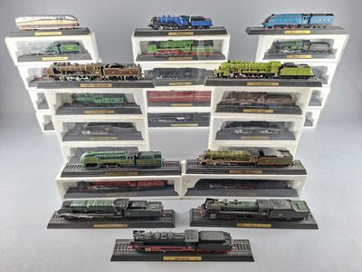 a lot of toy trains on display in a display case