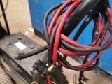 a small cart with a bunch of wires attached to it