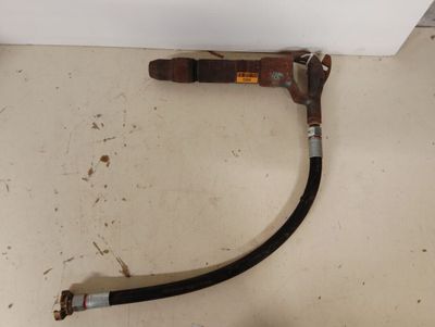 a hose attached to the side of a refrigerator