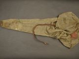 an image of an old leather bag with a hood on it
