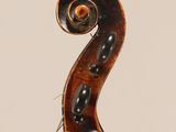 an antique violin with a long neck and a curved back
