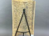 a large piece of paper with a hammer on top of it