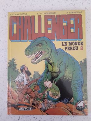 un gros plan d'une bande dessinée avec un dinosaure en couverture