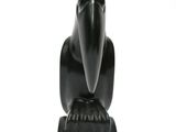 a black sculpture of a bird on a white background