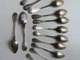 a lot of spoons and spoon spoons on the table