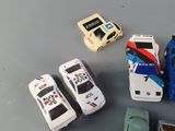 a lot of toy cars that are on the table
