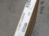 a cardboard box with a label on it sitting on a carton