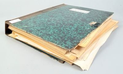 several books stacked on top of each other on a table