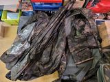 a pile of bags and other items on the floor