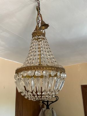 a chandelier hanging from the ceiling in a room