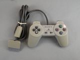 a video game controller that is connected to a charger