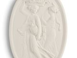 an image of a white plaque with a woman and a child
