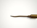 an old brass pipe with a wooden handle on a white background