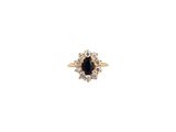 une image représentant une bague en or sertie d'un saphir bleu et de diamants blancs