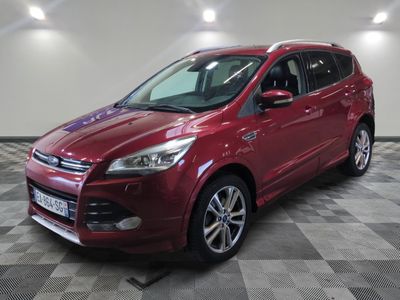the red ford kuga is parked on a checkered floor