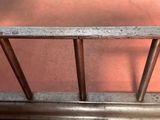 a close up of a metal rail on the floor