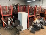 a room with a refrigerator, chair, and other items in it