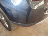 a close up of a car ' s rear bumper