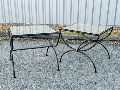 two tables that have glass tops on them