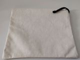 a close up of a small white bag with a black handle