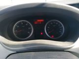 a close up of a car dashboard with a speedometer and gauges