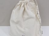 a white bag that is sitting on a table