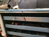 an image of a metal workbench in a garage