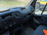 a view of the inside of a vehicle from the driver ' s seat