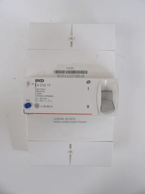 a close up of a white electrical device on a white surface