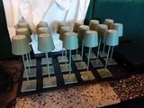 a table with a bunch of cake pops on top of it