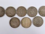 un lot de six pièces d'argent