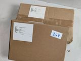 two boxes that are sitting on the floor