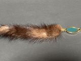 brown fur keychain with turquoise stone charm