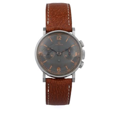 a close up of a watch on a white background with a brown strap