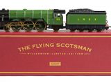 the flying scotsman train is on display in a red box