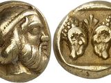 a gold coin with an image of a man and a woman on it