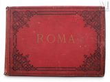 an old red book with the word roma written on it