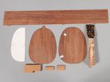a picture of a wooden table with a knife and cutting board