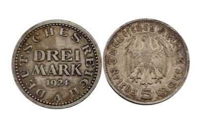 une pièce d'argent portant l'inscription « dreif mark »