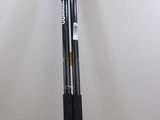 a toothbrush sitting on top of a pole in a room