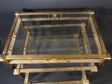 brass and glass coffee table with two shelves
