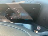 the dashboard of a car with a digital display on it