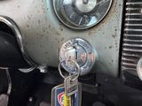 a close up of a car ' s dashboard with a key on it