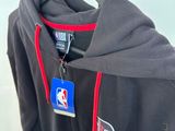 a close up of a jacket hanging on a hanger