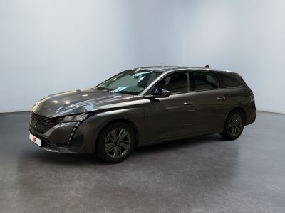 the grey toyota sienna is parked in a large room