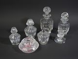 a lot of glass objects that are on a table