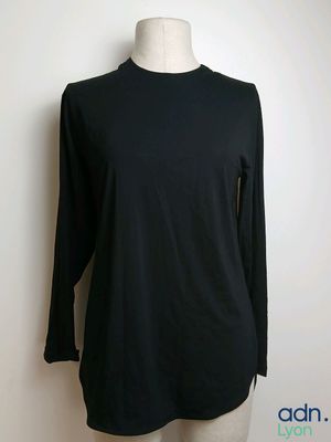 black long sleeved top on a mannequin mannequin mannequin mannequin mannequin mannequin mannequin mannequin mann