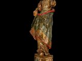 an image of a statue of a woman holding a baby