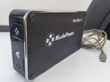an image of a black box with a cable attached